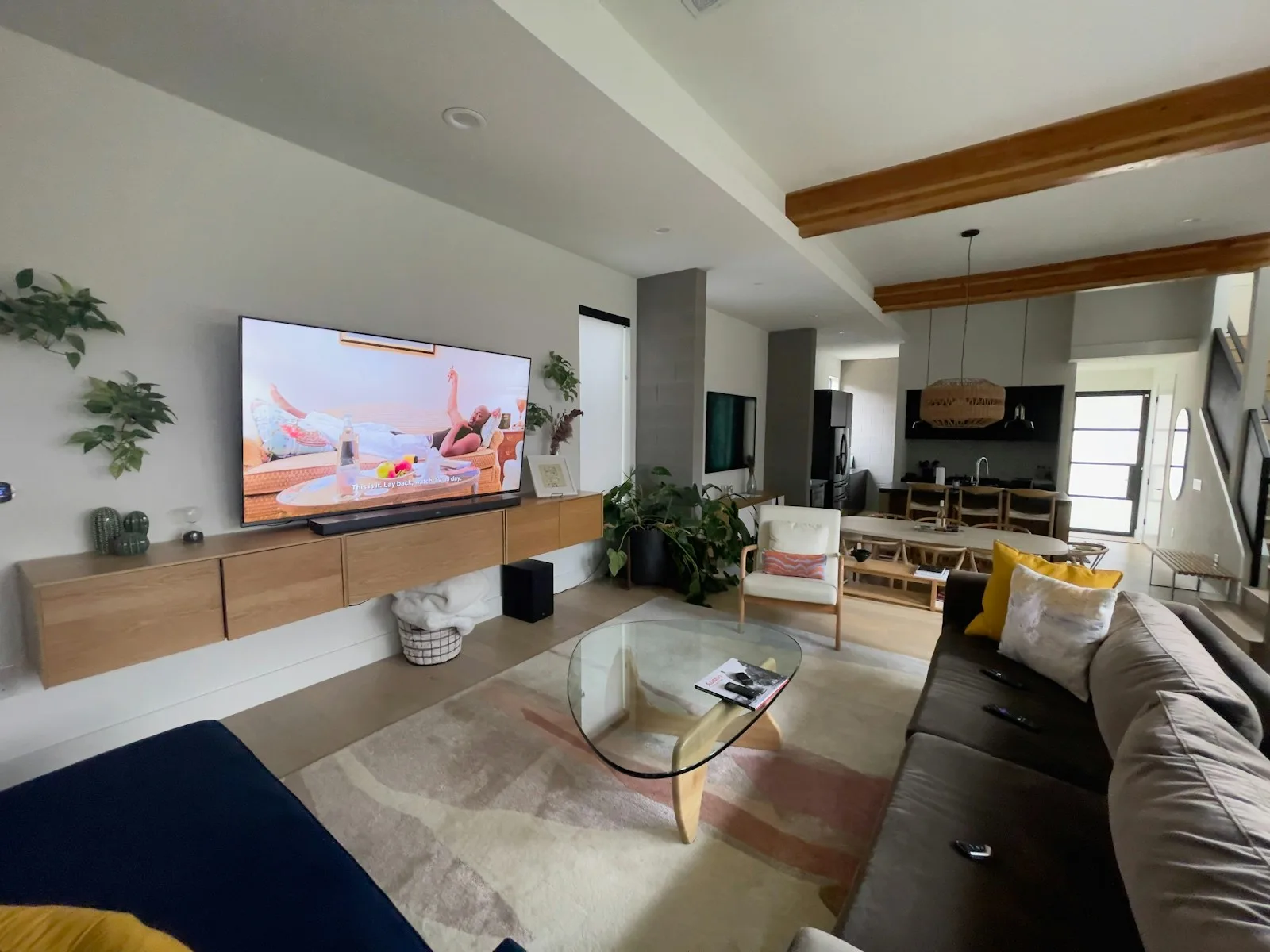 A living room filled with furniture and a flat screen TV